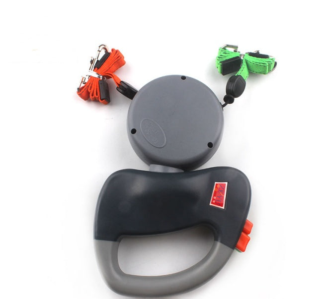 Retractable dog leash set with gray handle, black reel, and colorful leashes on a white background