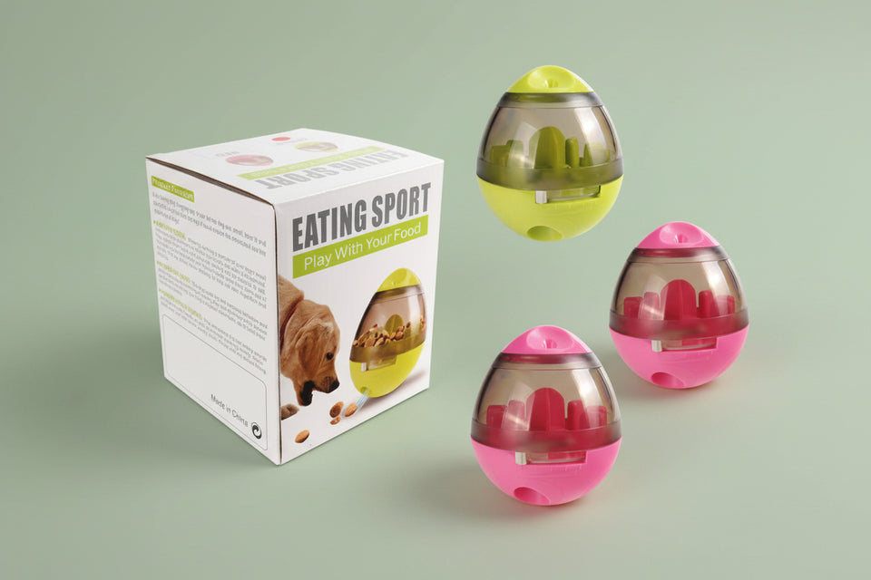 Close-up of the non-toxic, durable plastic wobble treat dispenser showing clear food chamber