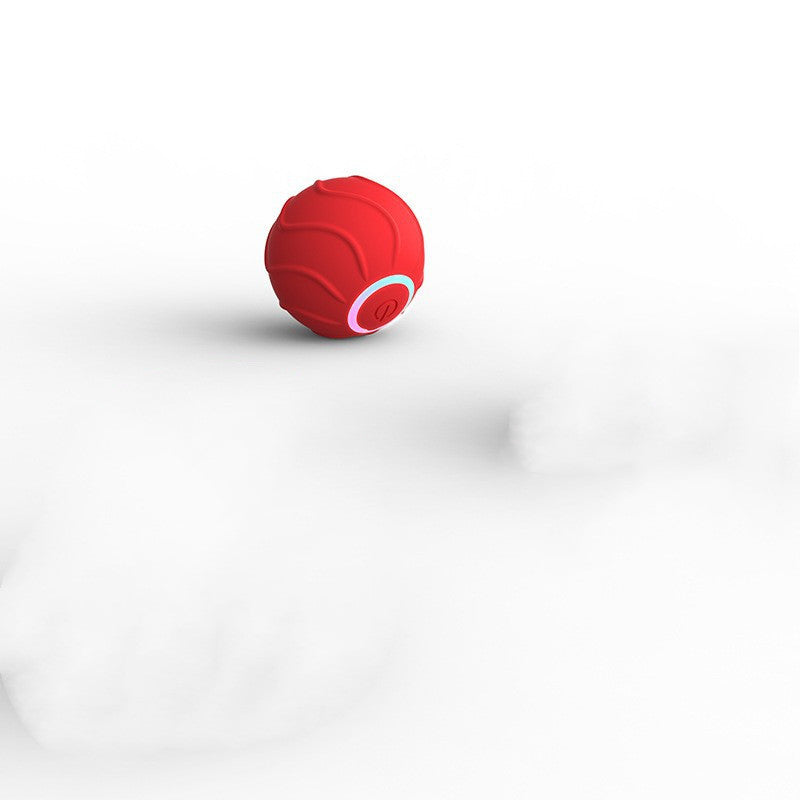Durable silicone self-rolling cat toy in red close-up view