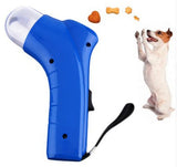 Blue dog training clicker with a dog and treats on a white background