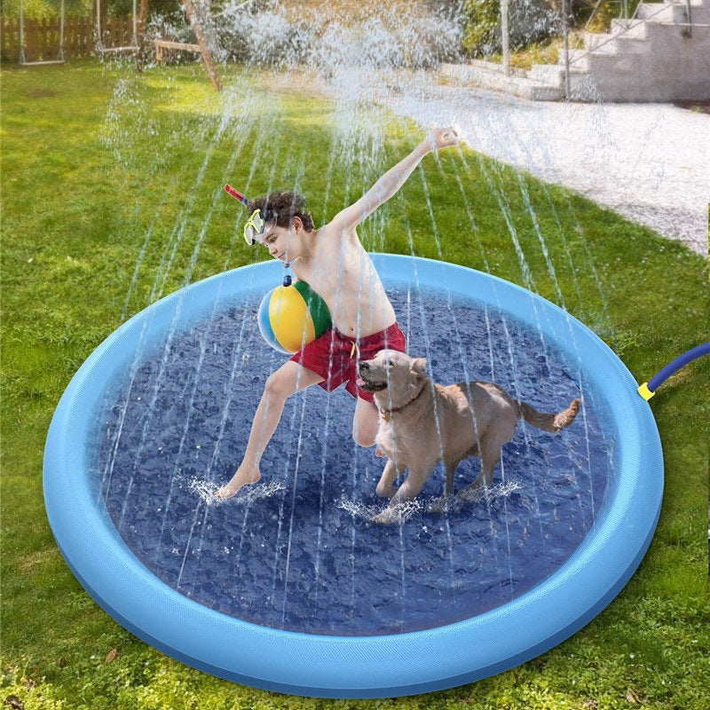 Happy dog and toddler splashing together on a non-slip water play mat in a sunny backyard