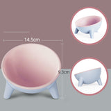 Sturdy triangular base elevated pet bowl preventing spills and tipping on floor.