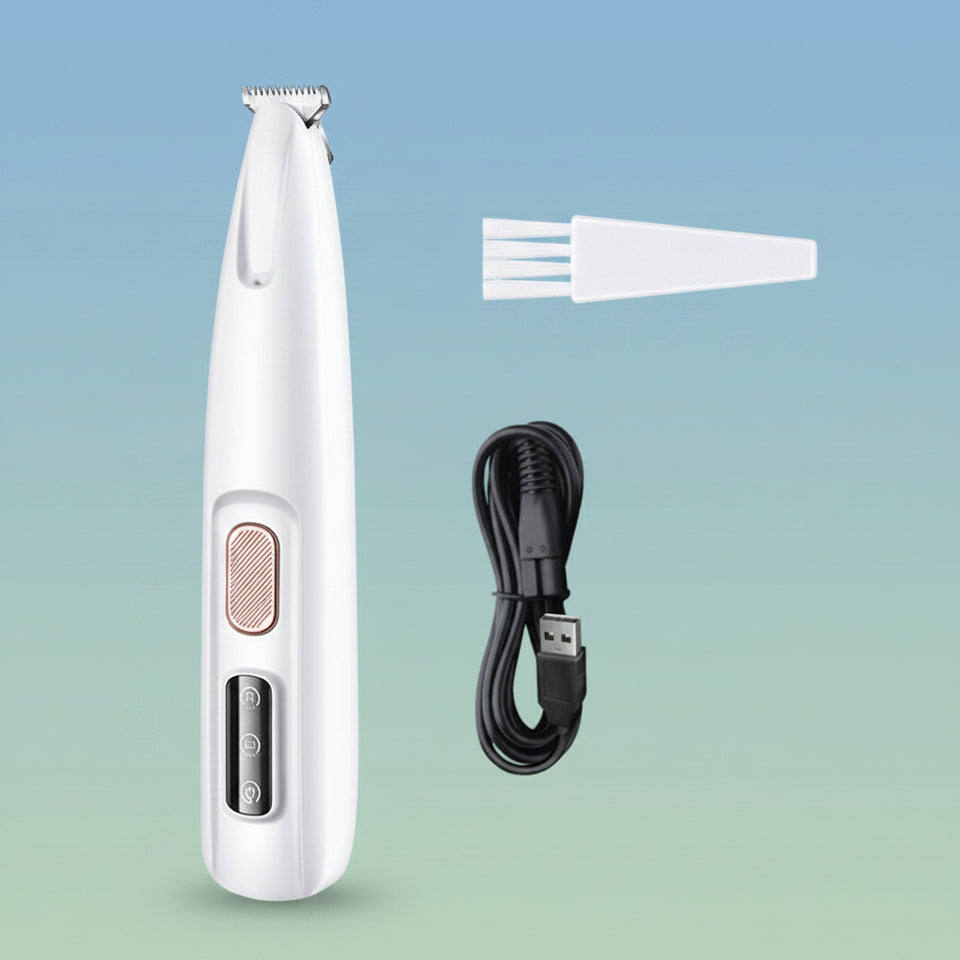 Waterproof cordless pet hair trimmer being rinsed clean under running water